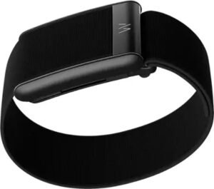 A WHOOP Strap 5.0 wearable on a wrist next to smart home gym gear, i